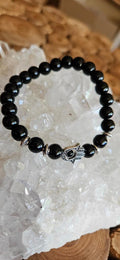Schwarzes Perlenarmband mit Hand der Fatima-Symbol in Silber