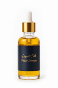 Liquid Silk Hair Serum in a glass dropper bottle with a golden cap, designed for shine and frizz control.