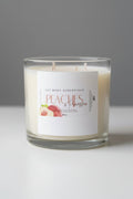 Jar with a label from Jaz Body Essentials featuring peaches and prosecco.
