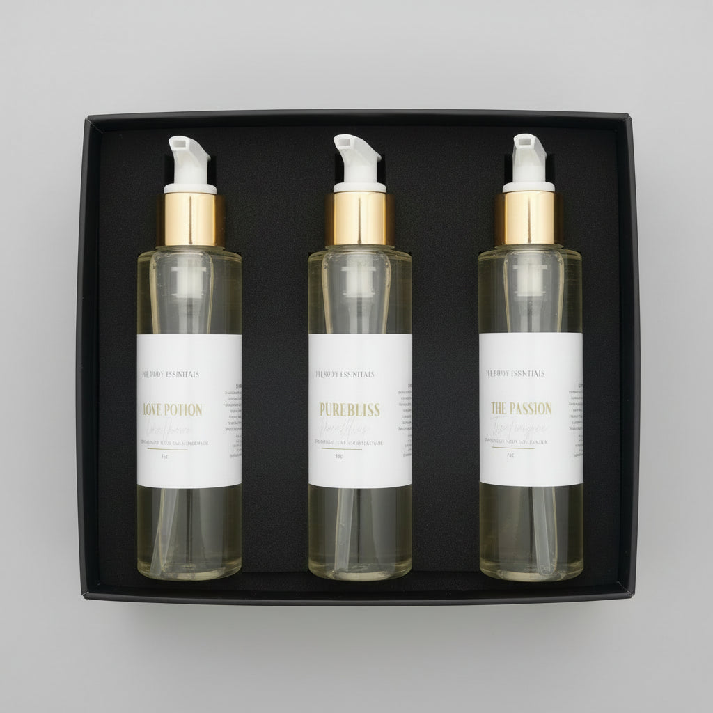 Three skincare bottles with gold and white pumps in a box.